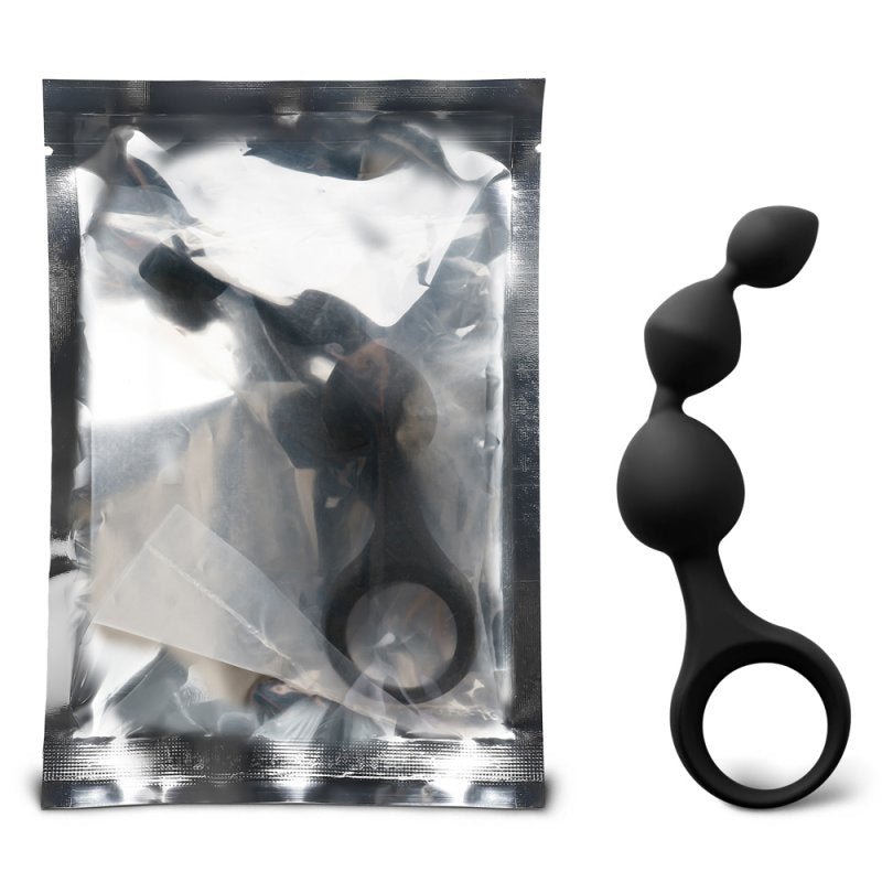 Sextoy anal en silicone noir avec perles successives pour insertion graduelle.
