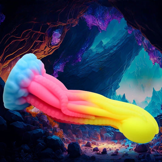 Sextoy multicolore avec textures en tentacules et finition phosphorescente pour utilisateurs aventureux.