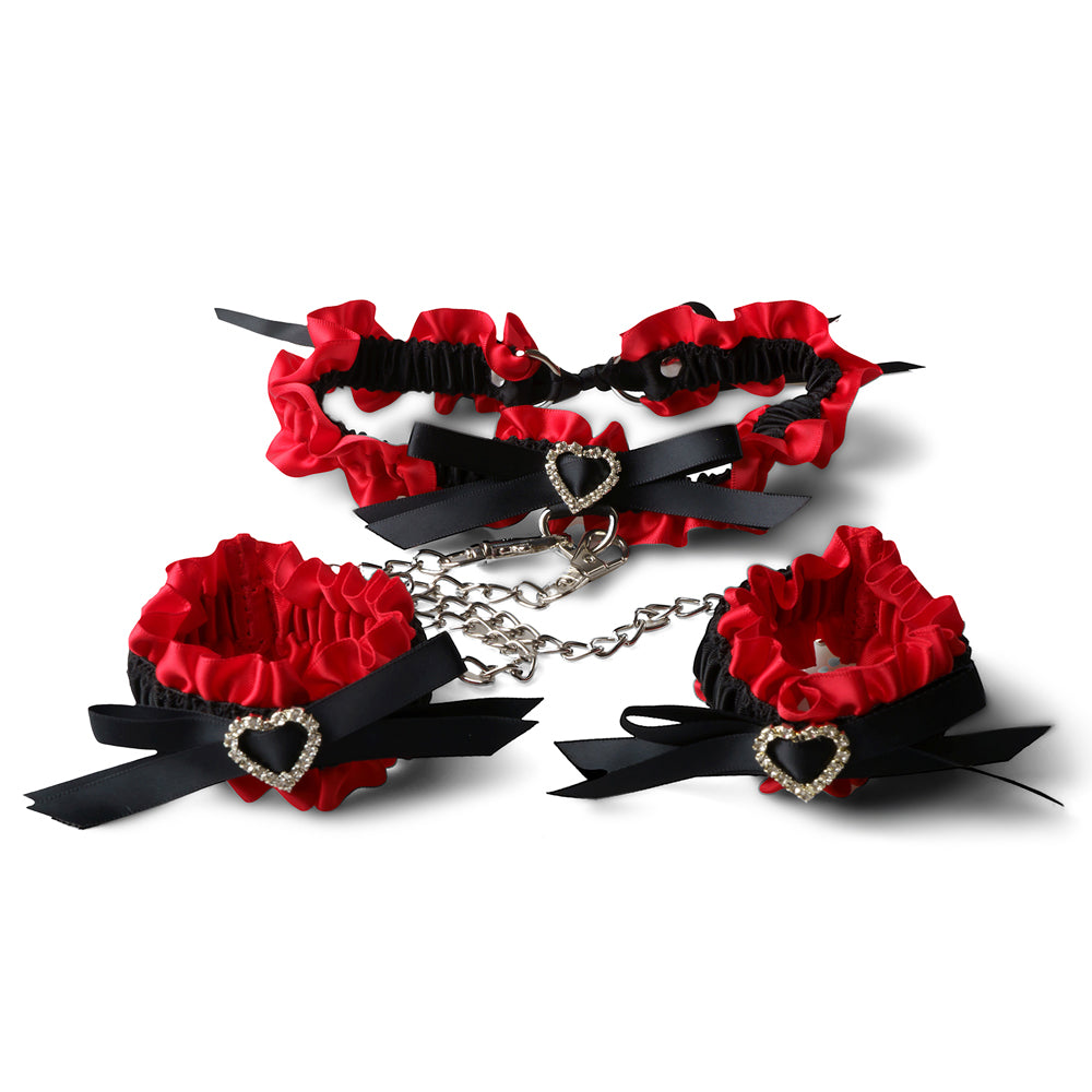 2.	Collier et menottes rouges pour kit Bondage BDSM élégant