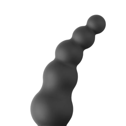 Stimulateur anal en silicone noir, 10 modes de vibration et base élargie pour une utilisation sécurisée. Fonctionne avec piles AAA.