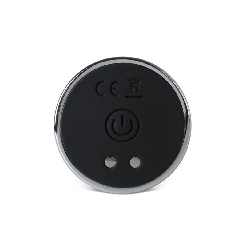 Plug anal en silicone et métal argent avec contrôle via application