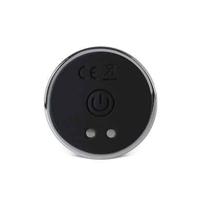 Plug anal en silicone et métal argent avec contrôle via application