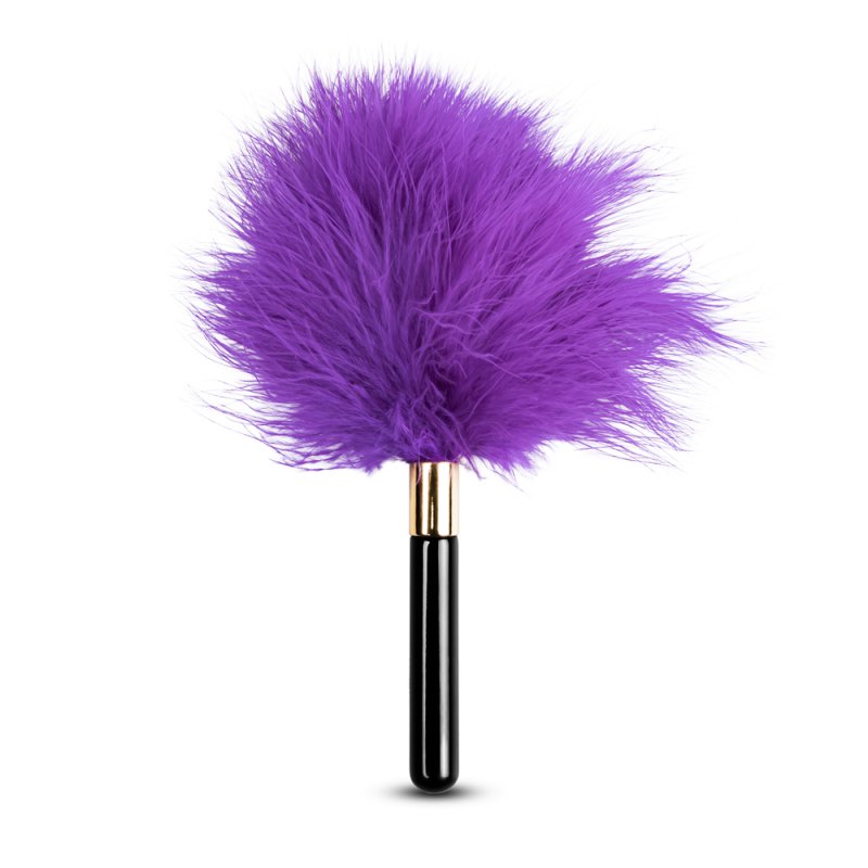 Plume chatouilleuse violette en peluche, idéale pour des moments de douceur et de complicité.