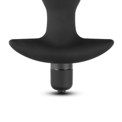 Plug anal noir en silicone avec vibrations réglables pour sensations variées.
