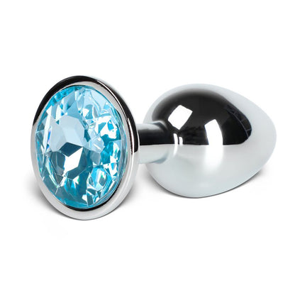 Petit plug anal métallique bleu avec base argentée, format compact pour débutants.