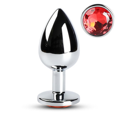 Plug anal de grande taille en métal avec pointe rouge et base large pour sécurité.