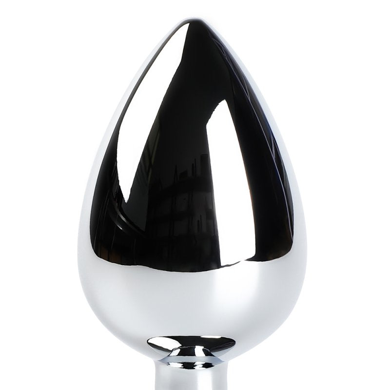 Plug anal robuste en métal et ABS avec finition rouge et base de maintien.