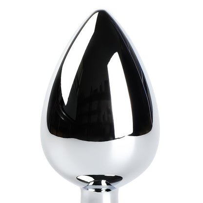 Plug anal robuste en métal et ABS avec finition rouge et base de maintien.