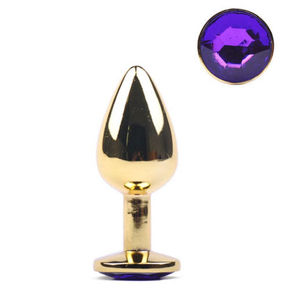 Plug anal en métal doré petite taille avec bijou violet à la base