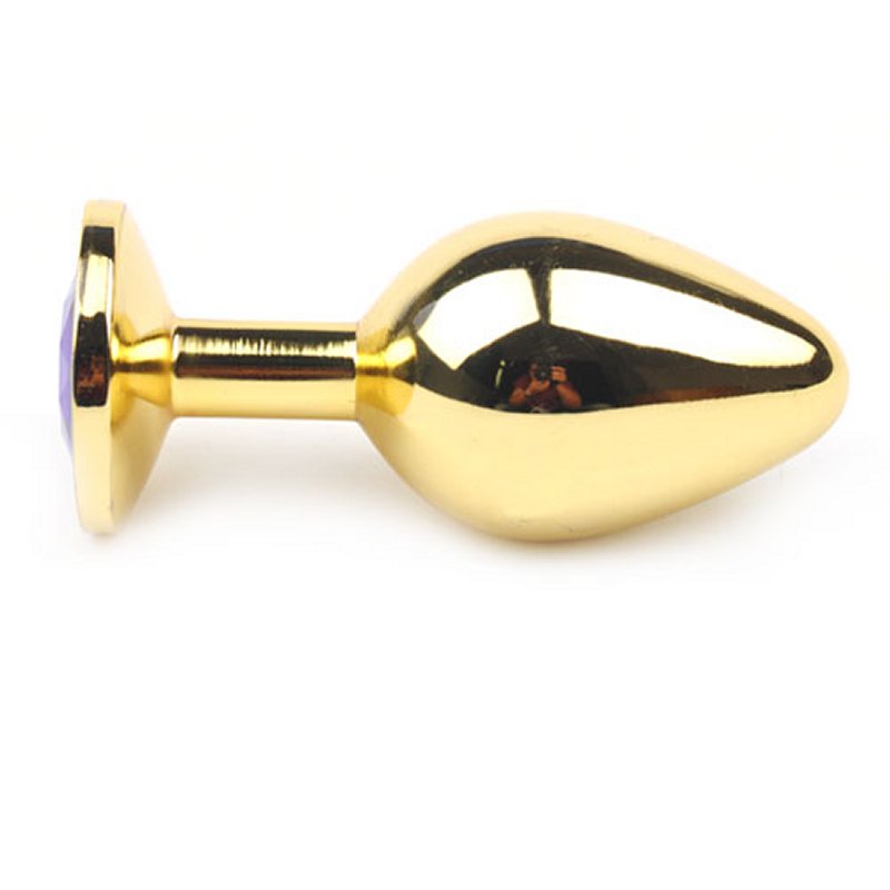 Plug anal en métal doré taille moyenne avec bijou violet à la base