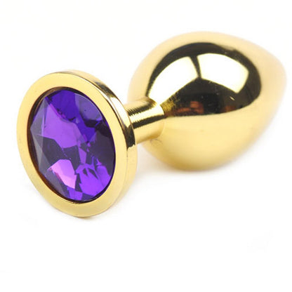 Sextoy plug anal doré en métal et ABS avec cristal violet