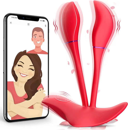 1.	Vibromasseur double pointe connecté en silicone rouge rechargeable