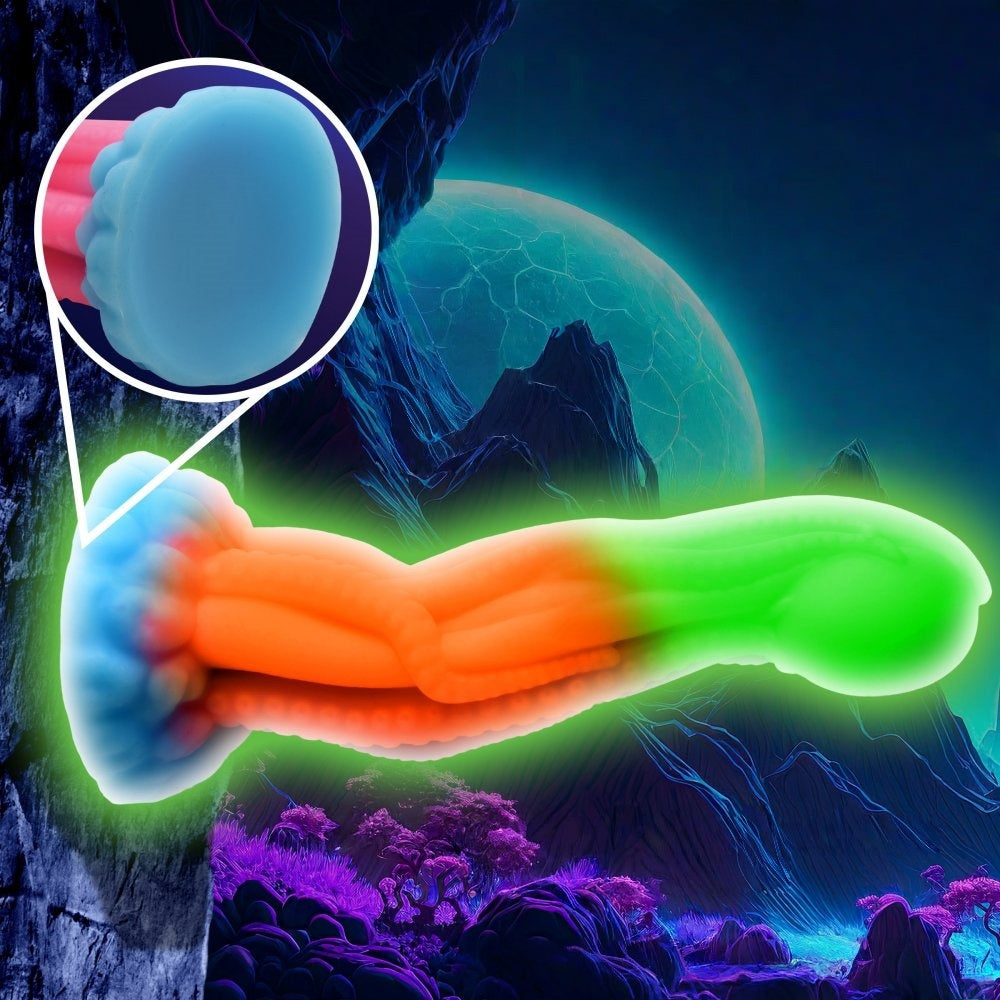 Sextoy silicone multicolore avec textures tentacules et finition phosphorescente dans le noir.