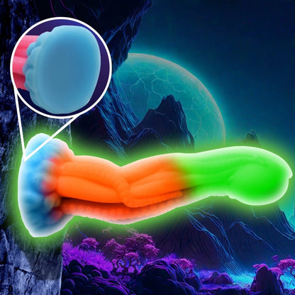 Sextoy silicone multicolore avec textures tentacules et finition phosphorescente dans le noir.