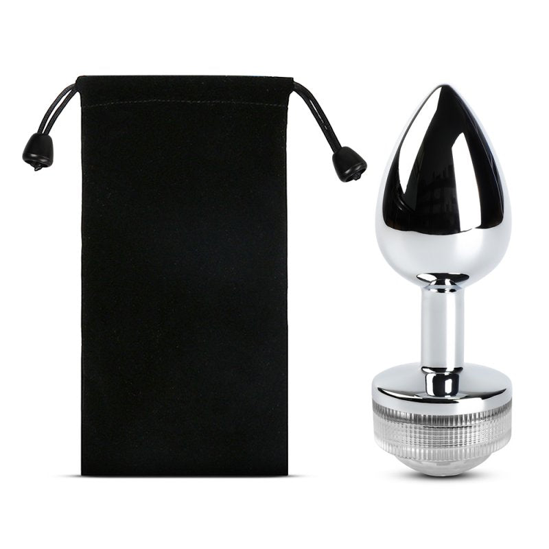 Sextoy anal métal lumineux argenté avec télécommande et design ergonomique
