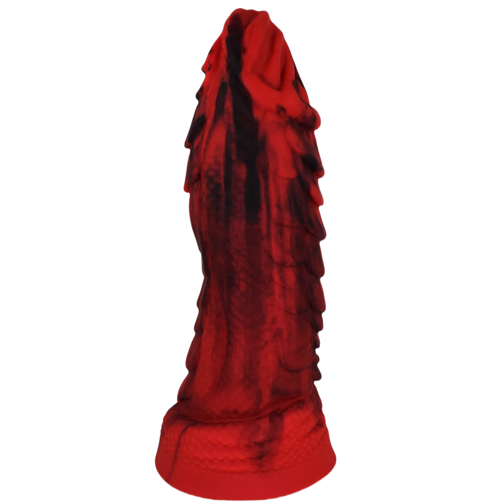 Sextoy audacieux style fantasy avec texture dragon rouge et noir et base évasée pour strap-on.