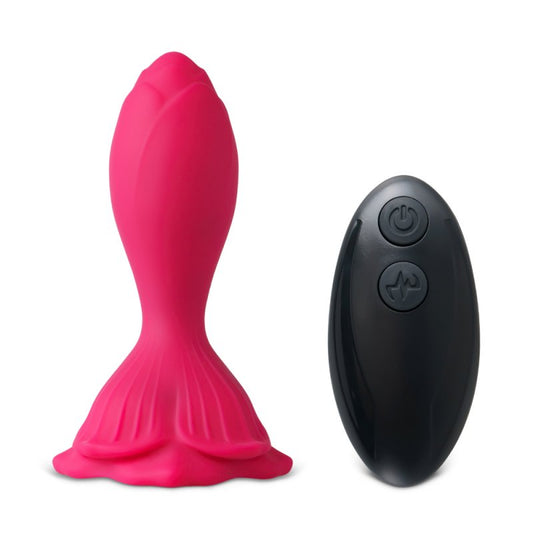 Plug anal vibrant en silicone doux avec télécommande sans fil, présenté sur fond neutre pour mettre en valeur sa forme ergonomique.